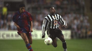 17 Sep 1997: Michael Reiziger (left) of Barcelona takes on Faustino Asprilla (right) of Newcastle United during the Champions League match at St James'' Park in Newcastle-upon-Tyne, England. Newcastle United won the match 3-2. \ Mandatory Credit: CliveBrunskill/Allsport