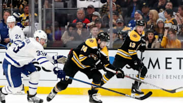 BOSTON, MA - OCTOBER 22: Toronto Maple Leafs right wing Frederik Gauthier (33) closes down Boston Bruins left wing Jake DeBrusk (74) during a game between the Boston Bruins and the Toronto Maple Leafs on October 22, 2019, at TD Garden in Boston, Massachusetts. (Photo by Fred Kfoury III/Icon Sportswire via Getty Images)