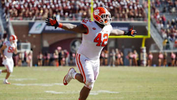 TALLAHASSEE, FL - OCTOBER 27: Christian Wilkins #42 of the Clemson Tigers celebrates in the fourth quarter of the game against the Florida State Seminoles at Doak Campbell Stadium on October 27, 2018 in Tallahassee, Florida. Clemson won 59-10. (Photo by Joe Robbins/Getty Images)
