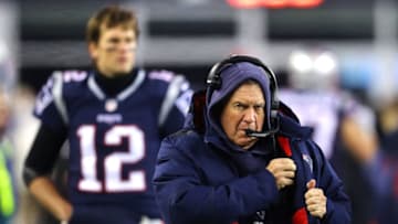 FOXBOROUGH, MA - JANUARY 13: Head coach Bill Belichick of the New England Patriots reacts as Tom Brady No. 12 looks on before the AFC Divisional Playoff game against the Tennessee Titans at Gillette Stadium on January 13, 2018 in Foxborough, Massachusetts. (Photo by Maddie Meyer/Getty Images)