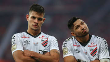 PORTO ALEGRE, BRAZIL - SEPTEMBER 18: Rony of Athletico PR (R) celebrates with teammate Bruno Guimarães after scoring the second goal of his team during the match between Internacional and Athletico PR as part of Copa do Brasil Final, at Beira-Rio Stadium on September 18, 2019 in Porto Alegre, Brazil. (Photo by Lucas Uebel/Getty Images)
