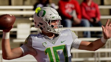 SALT LAKE CITY, UT - NOVEMBER 19: Quarterback Justin Herbert #10 of the Oregon Ducks throws during practice prior to their game against the Utah Utes at Rice-Eccles Stadium on November 19, 2016 in Salt Lake City, Utah. (Photo by Gene Sweeney Jr/Getty Images)