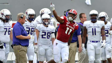 RALEIGH, NC - SEPTEMBER 01: Jakobi Meyers #11 of the North Carolina State Wolfpack reacts after making a catch for a fist down against the James Madison Dukes during their game at Carter-Finley Stadium on September 1, 2018 in Raleigh, North Carolina. (Photo by Grant Halverson/Getty Images)