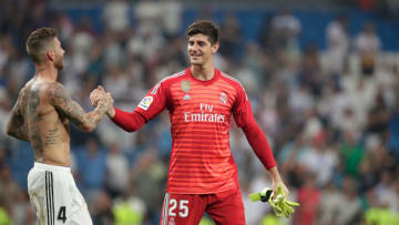 MADRID, SPAIN - SEPTEMBER 1: (L-R) Sergio Ramos of Real Madrid, Thibaut Courtois of Real Madrid celebrates the victory during the La Liga Santander match between Real Madrid v Leganes at the Santiago Bernabeu on September 1, 2018 in Madrid Spain (Photo by David S. Bustamante/Soccrates/Getty Images)