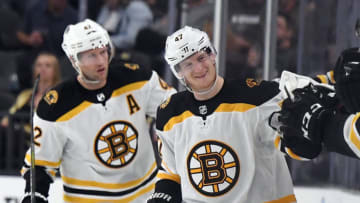 LAS VEGAS, NEVADA - OCTOBER 08: Torey Krug #47 of the Boston Bruins celebrates with teammates on the bench after scoring a second-period goal against the Vegas Golden Knights during their game at T-Mobile Arena on October 8, 2019 in Las Vegas, Nevada. (Photo by Ethan Miller/Getty Images)