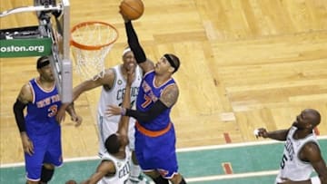 Apr 28, 2013; Boston, MA, USA; New York Knicks small forward Carmelo Anthony (7) drives the ball to the basket against Boston Celtics small forward Paul Pierce (34) during the fourth quarter in game four of the first round of the 2013 NBA playoffs at TD Garden. Mandatory Credit: David Butler II-USA TODAY Sports