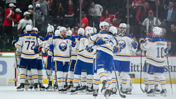 Apr 6, 2023; Detroit, Michigan, USA; Buffalo Sabres players celebrate after the game against the Detroit Red Wings at Little Caesars Arena. Mandatory Credit: Tim Fuller-USA TODAY Sports