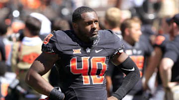 Sep 10, 2016; Stillwater, OK, USA; Oklahoma State Cowboys linebacker Devante Averette (40) reacts to the Central Michigan Chippewas win during the final second of the game at Boone Pickens Stadium. Central Michigan won 30-27. Mandatory Credit: Alonzo Adams-USA TODAY Sports