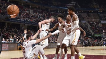 CLEVELAND, OH - JANUARY 30: The teammates of Larry Nance Jr. #22 of the Cleveland Cavaliers help him up during a game against the Toronto Raptors on January 30, 2020 at Rocket Mortgage FieldHouse in Cleveland, Ohio. NOTE TO USER: User expressly acknowledges and agrees that, by downloading and/or using this Photograph, user is consenting to the terms and conditions of the Getty Images License Agreement. Mandatory Copyright Notice: Copyright 2020 NBAE (Photo by David Liam Kyle/NBAE via Getty Images)