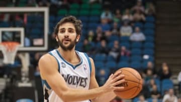 Apr 8, 2014; Minneapolis, MN, USA; Minnesota Timberwolves guard Ricky Rubio (9) passes at Target Center. Mandatory Credit: Brad Rempel-USA TODAY Sports