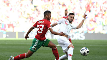 MOSCOW, RUSSIA - JUNE 20: Bruno Fernandes of Portugal is challenged by Mehdi Carcela of Morocco during the 2018 FIFA World Cup Russia group B match between Portugal and Morocco at Luzhniki Stadium on June 20, 2018 in Moscow, Russia. (Photo by Stu Forster/Getty Images)