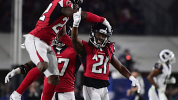 LOS ANGELES, CA - JANUARY 06: Cornerback Desmond Trufant #21 of the Atlanta Falcons celebrates his defensive play with teammates during the first quarter of the NFC Wild Card Playoff game against the Los Angeles Rams at Los Angeles Coliseum on January 6, 2018 in Los Angeles, California. (Photo by Harry How/Getty Images)