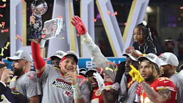 MIAMI, FLORIDA - FEBRUARY 02: Patrick Mahomes #15 of the Kansas City Chiefs raises the Vince Lombardi Trophy after defeating the San Francisco 49ers 31-20 in Super Bowl LIV at Hard Rock Stadium on February 02, 2020 in Miami, Florida. (Photo by Jamie Squire/Getty Images)