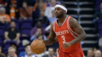 Feb 4, 2016; Phoenix, AZ, USA; Houston Rockets guard Ty Lawson (3) dribbles the ball up the court against the Phoenix Suns at Talking Stick Resort Arena. The Rockets won 111 - 105. Mandatory Credit: Jennifer Stewart-USA TODAY Sports
