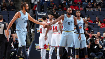 MEMPHIS, TN - FEBRUARY 27: Joakim Noah #55 and CJ Miles #6 of the Memphis Grizzlies high five during the game against the Chicago Bulls on February 27, 2019 at FedExForum in Memphis, Tennessee. NOTE TO USER: User expressly acknowledges and agrees that, by downloading and/or using this photograph, user is consenting to the terms and conditions of the Getty Images License Agreement. Mandatory Copyright Notice: Copyright 2019 NBAE (Photo by Joe Murphy/NBAE via Getty Images)