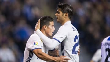 LA CORUNA, SPAIN - APRIL 26: James Rodriguez of Real Madrid celebrates with his teammates Alvaro Morata of Real Madrid after scoring his team's fourth goal during the La Liga match between RC Deportivo La Coruna and Real Madrid at Riazor Stadium on April 26, 2017 in La Coruna, Spain. (Photo by Juan Manuel Serrano Arce/Getty Images)