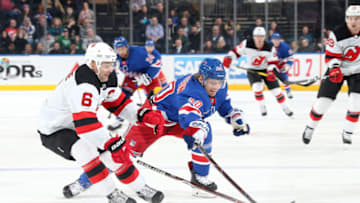 NEW YORK, NY - MARCH 09: Lias Andersson #50 of the New York Rangers skates for the puck against Andy Greene #6 of the New Jersey Devils at Madison Square Garden on March 9, 2019 in New York City. (Photo by Jared Silber/NHLI via Getty Images)