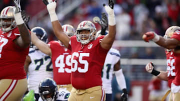 SANTA CLARA, CA - JANUARY 01: Joshua Garnett #65 of the San Francisco 49ers reacts after Shaun Draughn #24 of the San Francisco 49ers ran in for a touchdown against the Seattle Seahawks at Levi's Stadium on January 1, 2017 in Santa Clara, California. (Photo by Ezra Shaw/Getty Images)