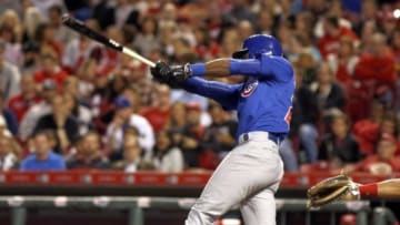 Sep 30, 2015; Cincinnati, OH, USA; Chicago Cubs center fielder Austin Jackson hits a two-run double against the Cincinnati Reds in the third inning at Great American Ball Park. Mandatory Credit: David Kohl-USA TODAY Sports