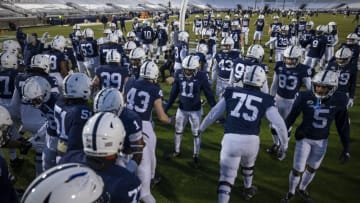 STATE COLLEGE, PA - DECEMBER 19: Penn State Nittany Lions players take the field before the game against the Illinois Fighting Illini at Beaver Stadium on December 19, 2020 in State College, Pennsylvania. (Photo by Scott Taetsch/Getty Images)