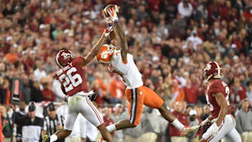 Jan 9, 2017; Tampa, FL, USA; Clemson Tigers wide receiver Mike Williams (7) makes a catch while defended by Alabama Crimson Tide defensive back Marlon Humphrey (26) during the fourth quarter in the 2017 College Football Playoff National Championship Game at Raymond James Stadium. Mandatory Credit: Steve Mitchell-USA TODAY Sports