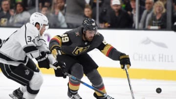 LAS VEGAS, NV - SEPTEMBER 26: Alex Tuch #89 of the Vegas Golden Knights and Kale Clague #34 of the Los Angeles Kings vie for the puck during a preseason game at T-Mobile Arena on September 26, 2017 in Las Vegas, Nevada. Los Angeles won 3-2 in overtime. (Photo by David Becker/NHLI via Getty Images)