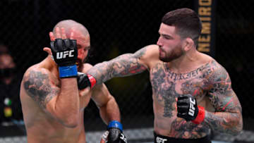 LAS VEGAS, NEVADA - AUGUST 29: (R-L) Sean Brady punches Christian Aguilera in their welterweight fight during the UFC Fight Night event at UFC APEX on August 29, 2020 in Las Vegas, Nevada. (Photo by Jeff Bottari/Zuffa LLC)