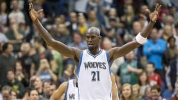 Mar 7, 2015; Minneapolis, MN, USA; Minnesota Timberwolves forward Kevin Garnett (21) raises his arms to get the crowd pumped up in the second half against the Portland Trail Blazers at Target Center. The Timberwolves won 121-113. Mandatory Credit: Jesse Johnson-USA TODAY Sports