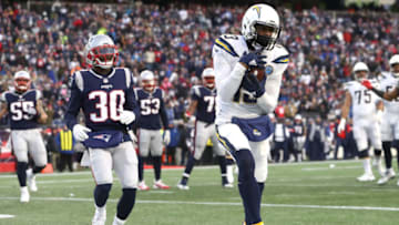FOXBOROUGH, MASSACHUSETTS - JANUARY 13: Keenan Allen #13 of the Los Angeles Chargers completes a two point conversion during the fourth quarter in the AFC Divisional Playoff Game against the New England Patriots at Gillette Stadium on January 13, 2019 in Foxborough, Massachusetts. (Photo by Al Bello/Getty Images)