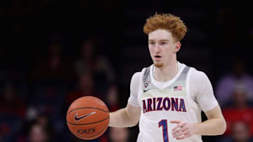 TUCSON, ARIZONA - JANUARY 16: Nico Mannion #1 of the Arizona Wildcats handles the ball during the first half of the NCAA men's basketball game against the Utah Utes at McKale Center on January 16, 2020 in Tucson, Arizona. (Photo by Christian Petersen/Getty Images)