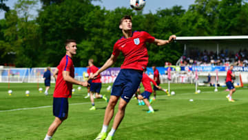 CHANTILLY, FRANCE - JUNE 07: John Stones heads the ball during an England training session ahead of the UEFA EURO 2016 at Stade du Bourgognes on June 7, 2016 in Chantilly, France. England's opening match at the European Championship is against Russia on June 11. (Photo by Dan Mullan/Getty Images)
