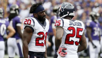 Sep 22, 2013; Baltimore, MD, USA; Houston Texans safety Ed Reed (20) talks with cornerback Kareem Jackson (25) during the game against the Baltimore Ravens at M&T Bank Stadium. Mandatory Credit: Mitch Stringer-USA TODAY Sports