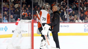 PHILADELPHIA, PENNSYLVANIA - NOVEMBER 01: Carter Hart #79 of the Philadelphia Flyers receives medical attention during the first period against the Buffalo Sabres at the Wells Fargo Center on November 01, 2023 in Philadelphia, Pennsylvania. (Photo by Tim Nwachukwu/Getty Images)