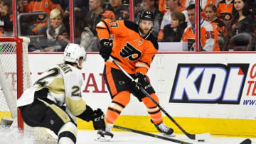 Apr 9, 2016; Philadelphia, PA, USA; Philadelphia Flyers defenseman Andrew MacDonald (47) looks to pass the puck against Pittsburgh Penguins center Kael Mouillierat (22) during the first period at Wells Fargo Center. Mandatory Credit: Derik Hamilton-USA TODAY Sports