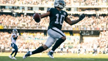 December 8, 2019; Oakland, CA, USA; Oakland Raiders wide receiver Rico Gafford (10) scores a touchdown during the second quarter against the Tennessee Titans at Oakland Coliseum. Mandatory Credit: Kyle Terada-USA TODAY Sports