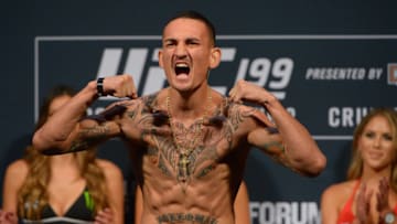 INGLEWOOD, CA - JUNE 03: Max Holloway stands on the scale during the weigh-in for UFC 199 at The Forum on June 1, 2016 in Inglewood, California. (Photo by Jayne Kamin-Oncea/Getty Images)