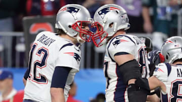 MINNEAPOLIS, MN - FEBRUARY 04: Tom Brady #12 and Rob Gronkowski #87 of the New England Patriots celebrate a 5-yard touchdown against the Philadelphia Eagles in the third quarter of Super Bowl LII at U.S. Bank Stadium on February 4, 2018 in Minneapolis, Minnesota. (Photo by Elsa/Getty Images)