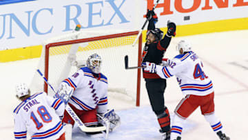 TORONTO, ONTARIO - AUGUST 01: Vincent Trocheck #16 of the Carolina Hurricanes celebrates a short-handed goal by Martin Necas #88 (not shown) against Henrik Lundqvist #30 of the New York Rangers at 10:51 of the third period in Game One of the Eastern Conference Qualification Round prior to the 2020 NHL Stanley Cup Playoffs at Scotiabank Arena on August 1, 2020 in Toronto, Ontario, Canada. The Hurricanes defeated the Rangers 3-2. (Photo by Andre Ringuette/Getty Images)