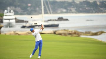 PEBBLE BEACH, CALIFORNIA - JUNE 13: Rickie Fowler of the United States plays a second shot on the 18th hole during the first round of the 2019 U.S. Open at Pebble Beach Golf Links on June 13, 2019 in Pebble Beach, California. (Photo by Ross Kinnaird/Getty Images)