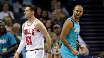 CHARLOTTE, NC - OCTOBER 26: Ryan Arcidiacono #51 of the Chicago Bulls watches on as Tony Parker #9 of the Charlotte Hornets reacts after a play during their game at Spectrum Center on October 26, 2018 in Charlotte, North Carolina. NOTE TO USER: User expressly acknowledges and agrees that, by downloading and or using this photograph, User is consenting to the terms and conditions of the Getty Images License Agreement. (Photo by Streeter Lecka/Getty Images)