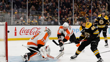 Nov 17, 2022; Boston, Massachusetts, USA; Boston Bruins center David Krejci (46) scores on Philadelphia Flyers goaltender Carter Hart (79) during the third period at TD Garden. Mandatory Credit: Winslow Townson-USA TODAY Sports