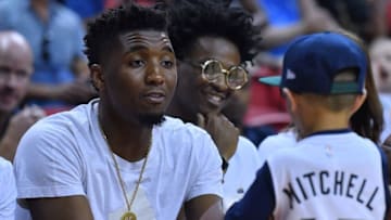 LAS VEGAS, NV - JULY 10: Donovan Mitchell #45 of the Utah Jazz signs a basketball for a fan during the 2018 NBA Summer League at the Thomas & Mack Center on July 10, 2018 in Las Vegas, Nevada. NOTE TO USER: User expressly acknowledges and agrees that, by downloading and or using this photograph, User is consenting to the terms and conditions of the Getty Images License Agreement. (Photo by Sam Wasson/Getty Images)