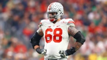 Jan 1, 2016; Glendale, AZ, USA; Ohio State Buckeyes offensive lineman Taylor Decker (68) against the Notre Dame Fighting Irish during the 2016 Fiesta Bowl at University of Phoenix Stadium. The Buckeyes defeated the Fighting Irish 44-28. Mandatory Credit: Mark J. Rebilas-USA TODAY Sports