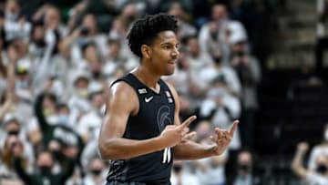 Michigan State's A.J. Hoggard celebrates after Joey Hauser's 3-pointer against Indiana during the first half on Saturday, Feb. 12, 2022, at the Breslin Center in East Lansing.220212 Msu Indiana Bball 127a