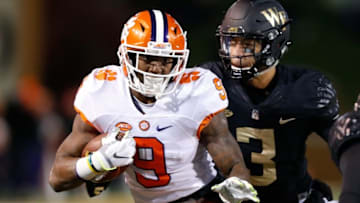Nov 19, 2016; Winston-Salem, NC, USA; Clemson Tigers running back Wayne Gallman (9) runs the ball during the second quarter against the Wake Forest Demon Deacons at BB&T Field. Mandatory Credit: Jeremy Brevard-USA TODAY Sports
