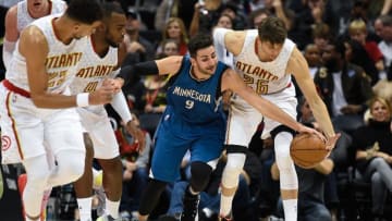 Dec 21, 2016; Atlanta, GA, USA; Minnesota Timberwolves guard Ricky Rubio (9) battles for the ball with Atlanta Hawks guard Kyle Korver (26) during the second half at Philips Arena. The Timberwolves defeated the Hawks 92-84. Mandatory Credit: Dale Zanine-USA TODAY Sports
