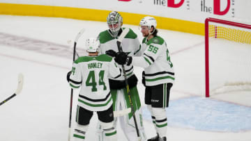 May 27, 2023; Las Vegas, Nevada, USA; Dallas Stars defenseman Joel Hanley (44) and goaltender Jake Oettinger (29) and defenseman Thomas Harley (55) celebrate on the ice after the Stars victory over the Vegas Golden Knights in game five of the Western Conference Finals of the 2023 Stanley Cup Playoffs at T-Mobile Arena. Mandatory Credit: Stephen R. Sylvanie-USA TODAY Sports