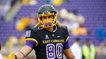 Sep 26, 2015; Greenville, NC, USA; East Carolina Pirates tight end Bryce Williams (80) reaches out before the game against the Virginia Tech Hokies at Dowdy-Ficklen Stadium. The East Carolina Pirates defeated the Virginia Tech Hokies 35-28. Mandatory Credit: James Guillory-USA TODAY Sports