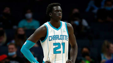 CHARLOTTE, NORTH CAROLINA - OCTOBER 07: JT Thor #21 of the Charlotte Hornets looks on during the fourth period of their game against the Memphis Grizzlies at Spectrum Center on October 07, 2021 in Charlotte, North Carolina. NOTE TO USER: User expressly acknowledges and agrees that, by downloading and or using this photograph, User is consenting to the terms and conditions of the Getty Images License Agreement. (Photo by Jared C. Tilton/Getty Images)