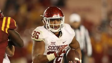Nov 3, 2016; Ames, IA, USA; Oklahoma Sooners fullback Dimitri Flowers (36) runs for a first down against the Iowa State Cyclones at Jack Trice Stadium. Oklahoma beat Iowa State 34 to 24. Mandatory Credit: Reese Strickland-USA TODAY Sports